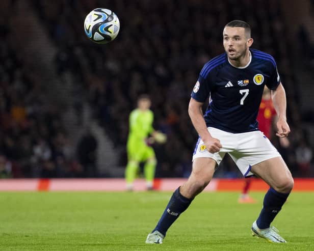 John McGinn in action for Scotland during the 2-0 win over Spain at Hampden in March. (Photo by Ross MacDonald / SNS Group)