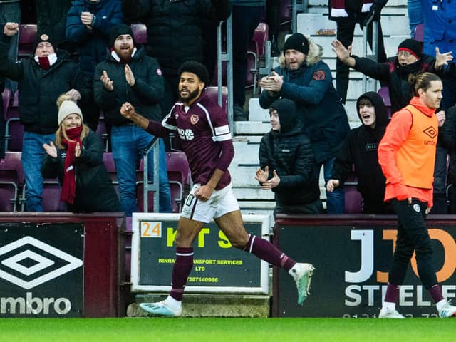 On loan Everton striker Ellis Simms laps up the applause of fans after scoring Hearts' second goal in the 2-0 win v Motherwell (Photo by Ross Parker / SNS Group)