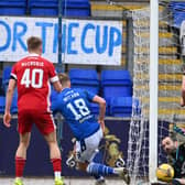 Aberdeen goalkeeper Joe Lewis makes an important late block to deny Ali McCann in Saturday's 1-0 win over St Johnstone in Perth  (Photo by Paul Devlin / SNS Group)