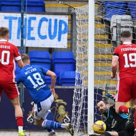 Aberdeen goalkeeper Joe Lewis makes an important late block to deny Ali McCann in Saturday's 1-0 win over St Johnstone in Perth  (Photo by Paul Devlin / SNS Group)