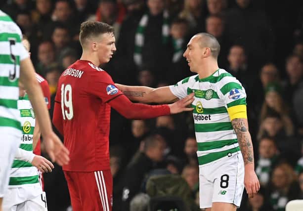 Celtic's Scott Brown noises up Aberdeen's Lewis Ferguson at the 2018 League Cup final - one of many such teasing moments the long-time pivotal Parkhead figure has indulged in against a Pittodrie side it has been reported he could join in the summer. (Photo by Craig Foy/SNS Group).
