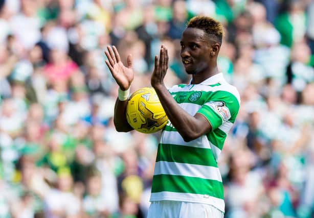 Celtic's Moussa Dembele with the match ball in September 2016 after scoring the first hat-trick in a league derby for 51 years  (Pic: SNS, Sammy Turner)