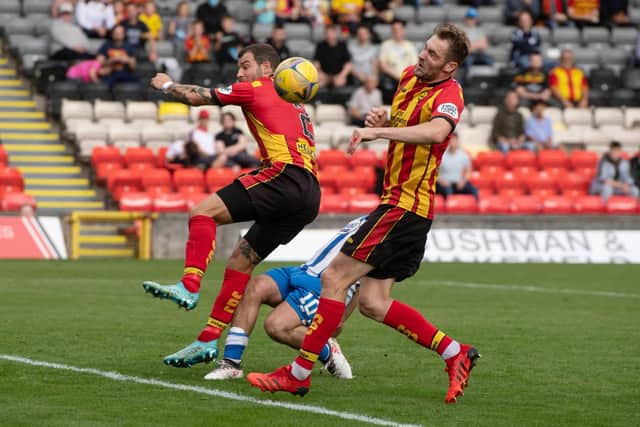Partick's Kevin Holt scores an own goal to make it 1-0 during the cinch Championship match between Partick Thistle and Kilmarnock at Firhill Stadium on September 18, 2021, in Glasgow, Scotland.  (Photo by Sammy Turner / SNS Group)
