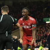 Aberdeen captain Anthony Stewart tries to plead his innocence after his red card.