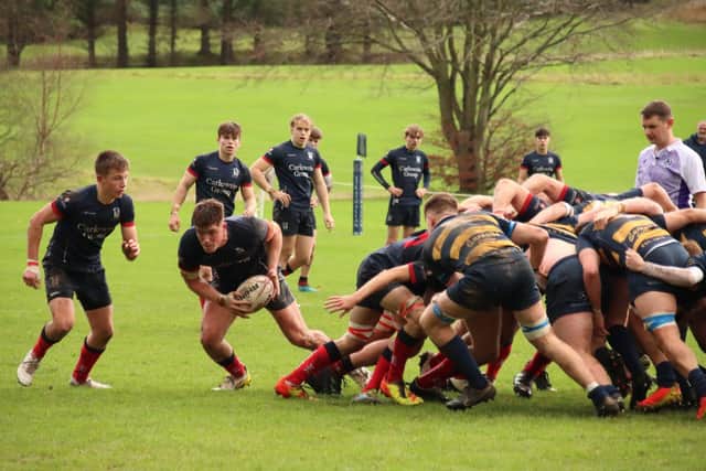 Hat-trick try scorer Tom Currie, on the ball, helped Merchiston Castle defeat Strathallan on Saturday