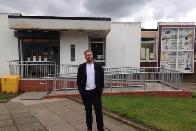 Damian Barr at Newarthill Library, which he has said saved his life, is keen to see NLC protect its school librarians (file image). Picture: contributed.