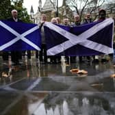 People outside the UK Supreme Court in London, while they waited for the decision by Supreme Court judges to grant or refuse the Scottish Parliament power to hold a referendum on independence. Picture: Aaron Chown/PA Wire