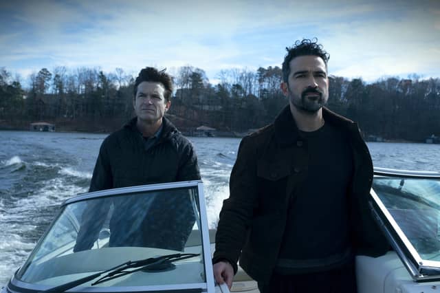 Ozark. (L to R) Jason Bateman as Martin 'Marty' Byrde, Alfonso Herrera as Javi in episode 401 of Ozark. Cr. Steve Dietl/Netflix © 2021