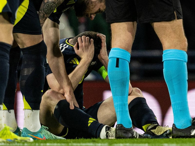 The Scotland captain's evening ended prematurely due to an ankle injury following a Trai Hume tackle. The Liverpool left-back looked disconsolate coming off on 36 minutes and his fitness will be a concern to both club and country. Lewis Ferguson replaced him as Scotland switched to a back four. n/a
