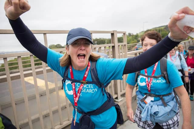 Women doing the kiltwalk for Cancer Research UK in 2019.