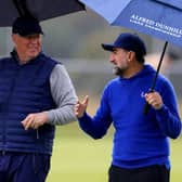 R&A chief executive Martin Slumbers chats to LIV Golf chairman Yasir Al-Rumayyan during their recent round together in the Alfred Dunhill Links Championship at St Andrews. Picture: Stephen Pond/Getty Images.