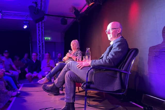 First Minister John Swinney appearing with comedian Susan Morrison at the Edinburgh Fringe - the event was disrupted five times by six different groups of protesters (Picture: Craig Paton/PA Wire)