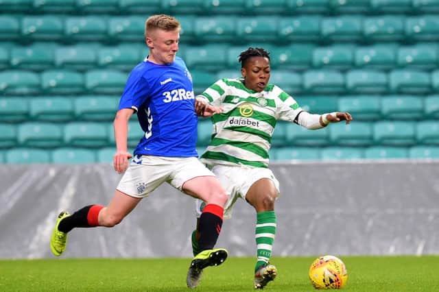 Celtic and Rangers' Under-20s compete in the City of Glasgow Cup final. The new plans could see both teams playing in the Lowland League next season