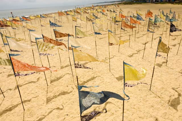 The Beach of Dreams Silks is a dynamic and travelling silk installation composed of hundreds of naturally-dyed pennants, each representing a personal story that reflects our relationship with the coast and sea.