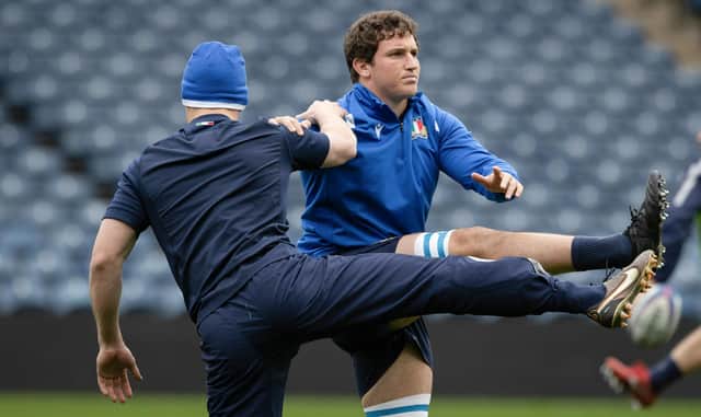 Italy captain Michele Lamaro limbers up at BT Murrayfield.  (Photo by Craig Williamson / SNS Group)