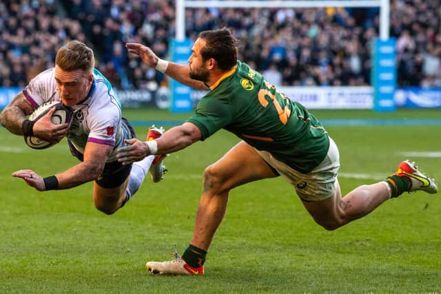 Stuart Hogg dives over for his second try against South Africa. (Photo by Ross Parker / SNS Group)