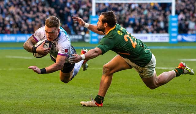 Stuart Hogg dives over for his second try against South Africa. (Photo by Ross Parker / SNS Group)