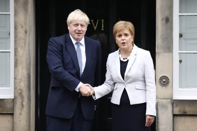 Nicola Sturgeon and Boris Johnson's handling of the Covid pandemic appears to have been equally chaotic and embarrassing (Picture: Duncan McGlynn/Getty Images)