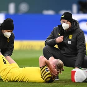 Borussia Dortmund striker Erling Haaland receives treatment for the injury he suffered against Hoffenheim last month and which will see him still sidelined for Thursday night's Europa League game against Rangers at Ibrox. (Photo by Alexander Scheuber/Getty Images)