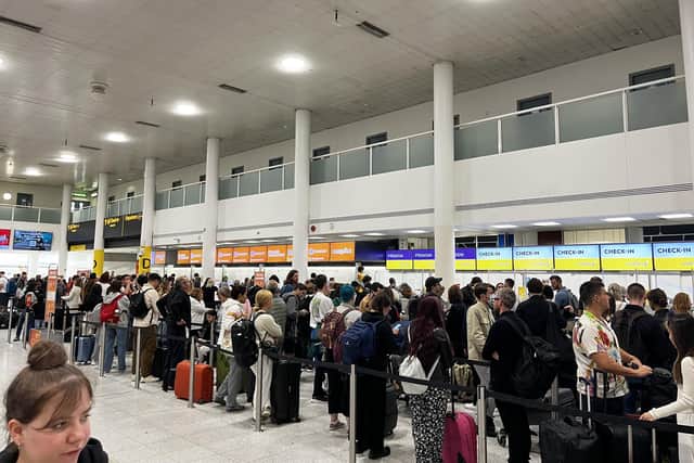 Queues at Gatwick South Terminal at 10:39hrs on Wednesday. More than 150 UK flights were cancelled on Wednesday and passengers who could travel were forced to wait in long queues at airports. Picture date: Wednesday June 1, 2022.