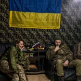 Ukrainian soldiers with the 56th Brigade in a bunker on the front line at Pisky, Ukraine, earlier this month (Picture: Brendan Hoffman/Getty Images)