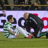 Celtic's Yosuke Ideguchi goes down injured during the Scottish Cup tie against Alloa.
