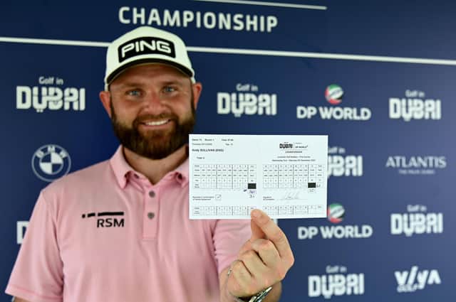 Andy Sullivan shows off scorecard after his course-record 61 in the first round of the Golf in Dubai Championship at Jumeirah Golf Estates. Picture: Ross Kinnaird/Getty Images