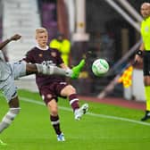 Istanbul Basaksehir's Bertrand Traore pokes the ball away from Hearts Alex Cochrane during a UEFA Europa Conference League match between the two clubs.