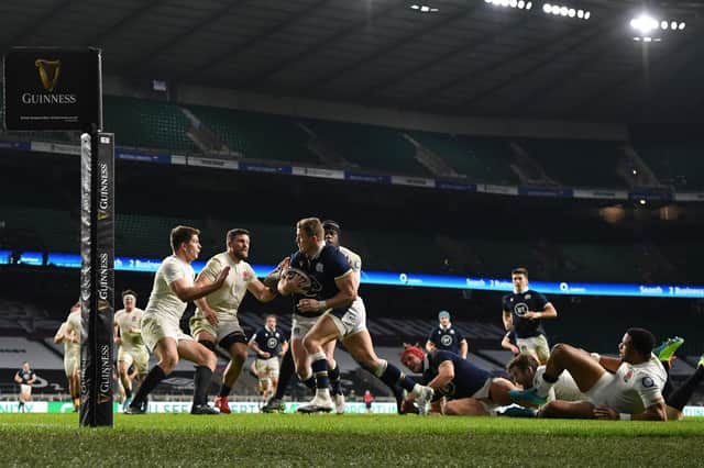 Scotland winger Duhan van der Merwe bursts through the England defence on his way to scoring the only try of the match in the 11-6 win at Twickenham. Picture: Mike Hewitt/Getty Images