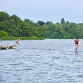 Paddleboarding and canoeing are popular at Fritton Lake, Norfolk.