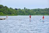 Paddleboarding and canoeing are popular at Fritton Lake, Norfolk.
