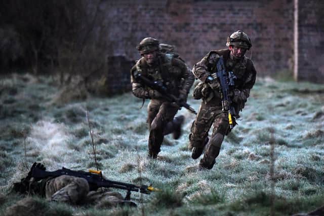 Royal Marines take part in raid during Exercise Joint Warrior in Dalbeattie,Scotland. Photo: Jeff J Mitchell/Getty Images