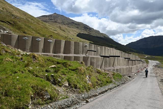 More bunds are to protect the Old Military Road after a 20ft high one was built after a landslide in 2020. (Photo by John Devlin/The Scotsman)