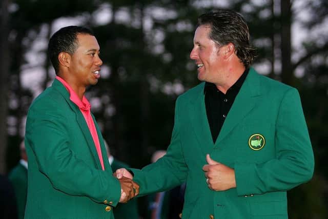 Tiger Woods, the defending champion, congratulates Phil Mickelson after his win in the 2006 Masters at Augusta National Golf Club. Picture: Andrew Redington/Getty Images.