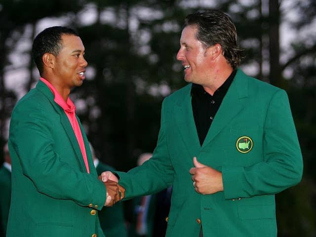 Tiger Woods, the defending champion, congratulates Phil Mickelson after his win in the 2006 Masters at Augusta National Golf Club. Picture: Andrew Redington/Getty Images.