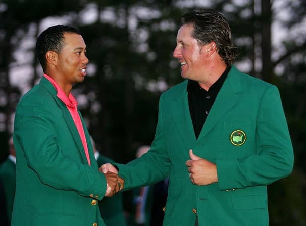 Tiger Woods, the defending champion, congratulates Phil Mickelson after his win in the 2006 Masters at Augusta National Golf Club. Picture: Andrew Redington/Getty Images.