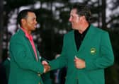 Tiger Woods, the defending champion, congratulates Phil Mickelson after his win in the 2006 Masters at Augusta National Golf Club. Picture: Andrew Redington/Getty Images.