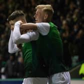 Kevin Nisbet sticks his fingers in his ears as he celebrates with Josh Doig after his winning goal for Hibs against Cove Rangers on January 20. (Photo by Craig Foy / SNS Group)