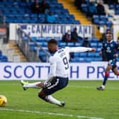 Jermain Defoe marks his 800th career appearance by scoring the final goal in Rangers' 4-0 win over Ross County in Dingwall on Sunday. (Photo by Craig Foy / SNS Group)