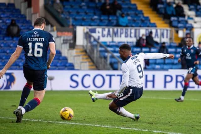 Jermain Defoe marks his 800th career appearance by scoring the final goal in Rangers' 4-0 win over Ross County in Dingwall on Sunday. (Photo by Craig Foy / SNS Group)