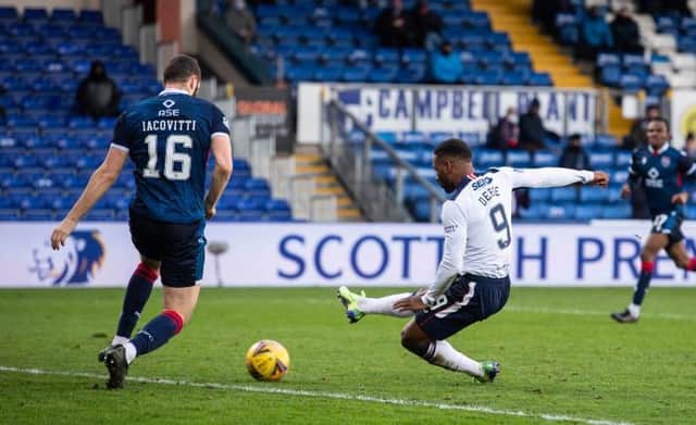 Jermain Defoe marks his 800th career appearance by scoring the final goal in Rangers' 4-0 win over Ross County in Dingwall on Sunday. (Photo by Craig Foy / SNS Group)