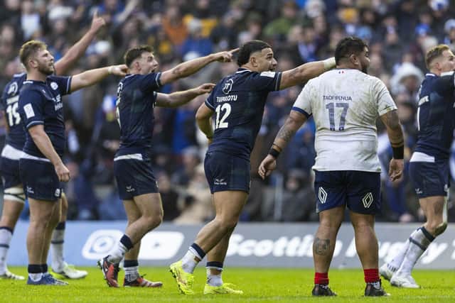 Scotland appeal as they watch the TMO review of Sam Skinner’s disallowed try against France.