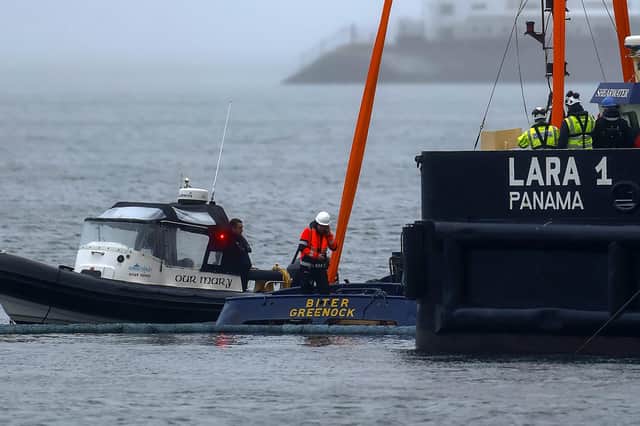 The crane ship Lara 1, from Liverpool, starts the salvage operation