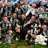 The Newcastle United squad following their historic Carabao Cup winning triumph over Liverpool - but no Scots   (Photo by Stu Forster/Getty Images)