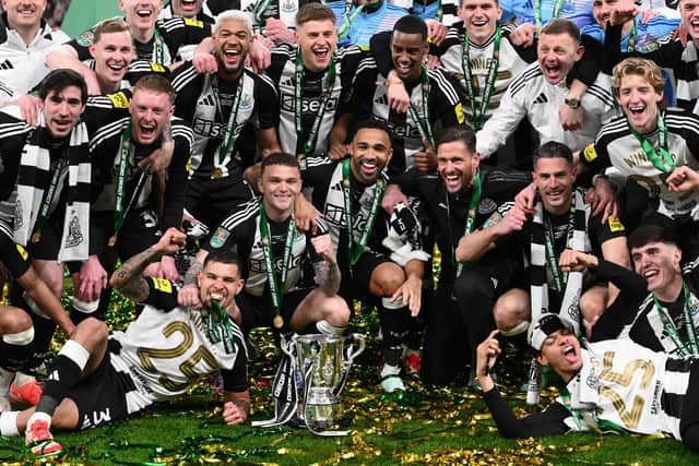 The Newcastle United squad following their historic Carabao Cup winning triumph over Liverpool - but no Scots (Photo by Stu Forster/Getty Images)