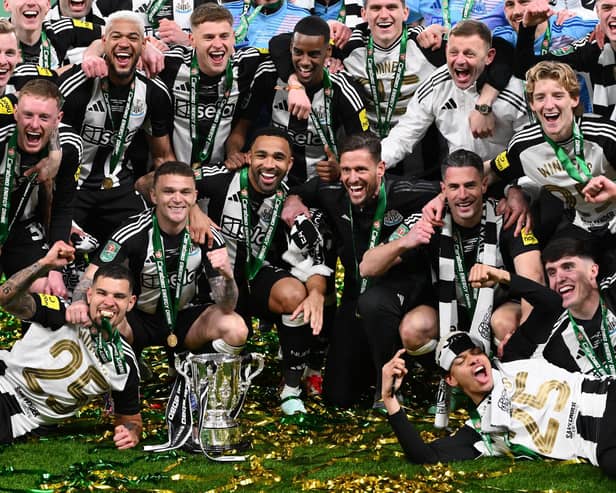 The Newcastle United squad following their historic Carabao Cup winning triumph over Liverpool - but no Scots   (Photo by Stu Forster/Getty Images)