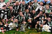 The Newcastle United squad following their historic Carabao Cup winning triumph over Liverpool - but no Scots   (Photo by Stu Forster/Getty Images)