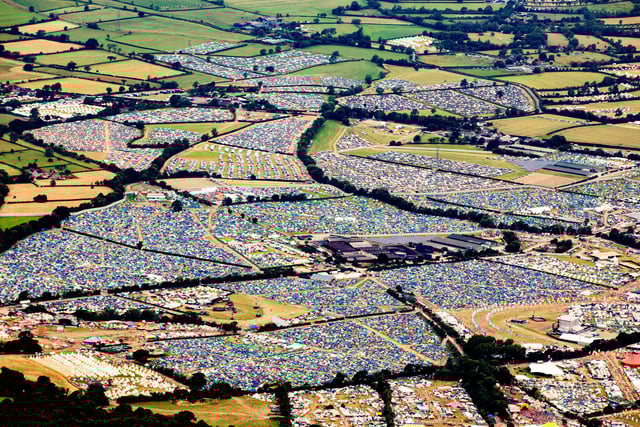 Aerial view of the Glastonbury Festival site in Somerset, England, June 23, 2022, where fans have descended for the first time in three years. See SWNS story SWBRglasto. More than 200,000 festival-goers will arrive at Worthy Farm in Somerset for the event, headlined by Billie Eilish, Sir Paul McCartney and Kendrick Lamar.