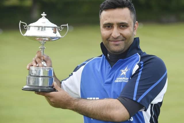 Kashif Hussain, who works as a representative for a Fleet Management Company, is pictured with the Masterton T:20 Trophy. Picture: Contributed