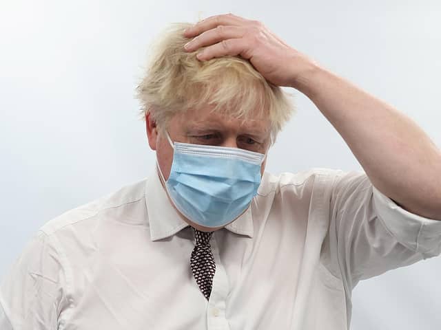 British Prime Minister Boris Johnson "categorically" rejected claims by his former chief aide, Dominic Cummings, that he lied to parliament last week about a Downing Street party held during a strict lockdown. Photo by Ian Vogler / POOL / AFP via Getty Images.
